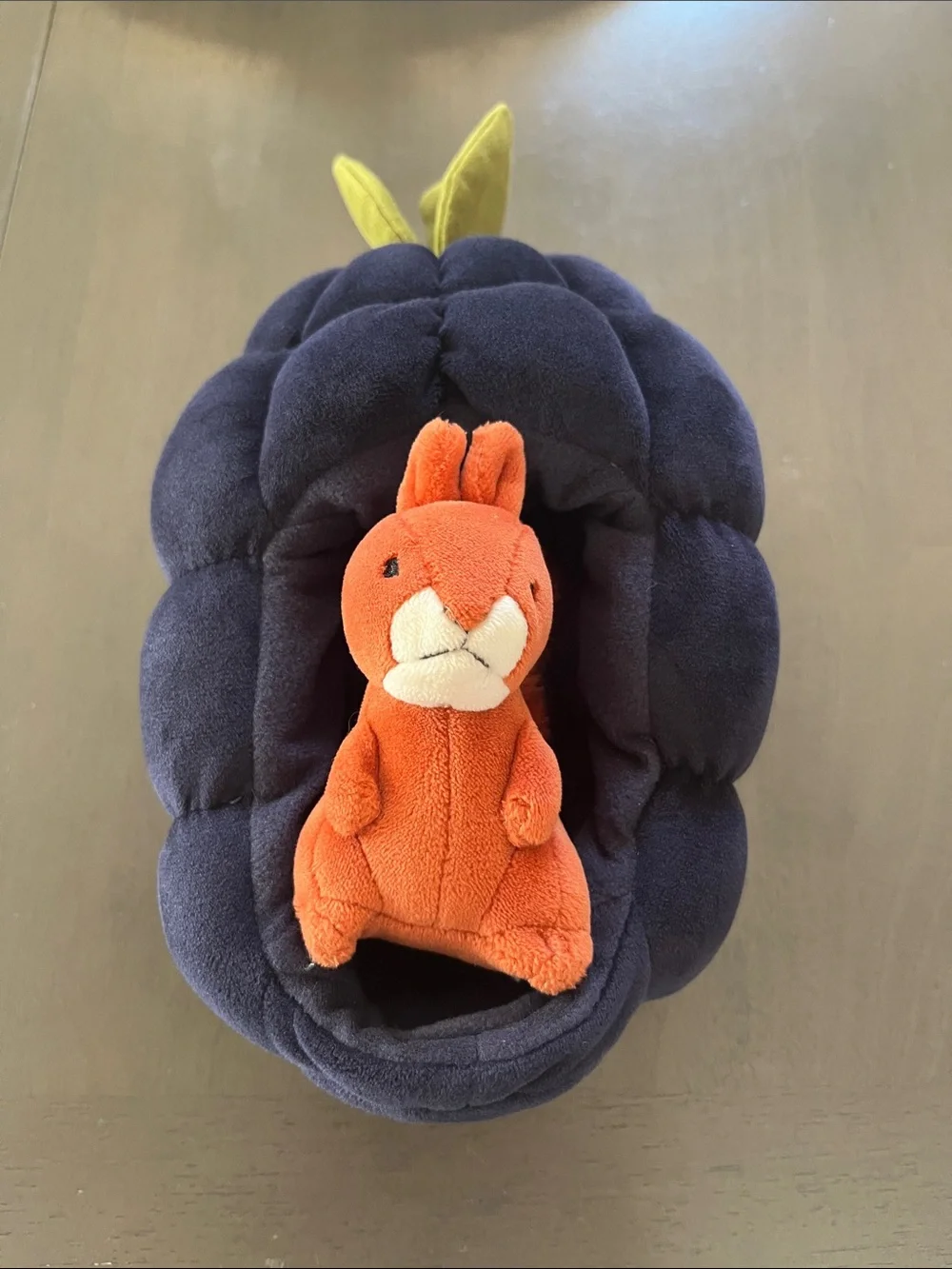 Jellycat Orange Squirrel with Fluffy Tail in Navy Plush Nest